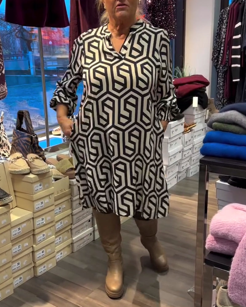 Robe élégante à col en V et motif géométrique