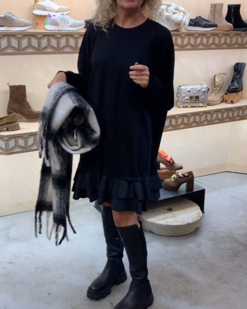 Robe à la silhouette élégante et aux manches longues