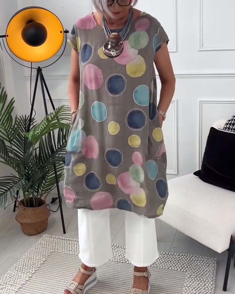Blouse imprimée à pois colorés