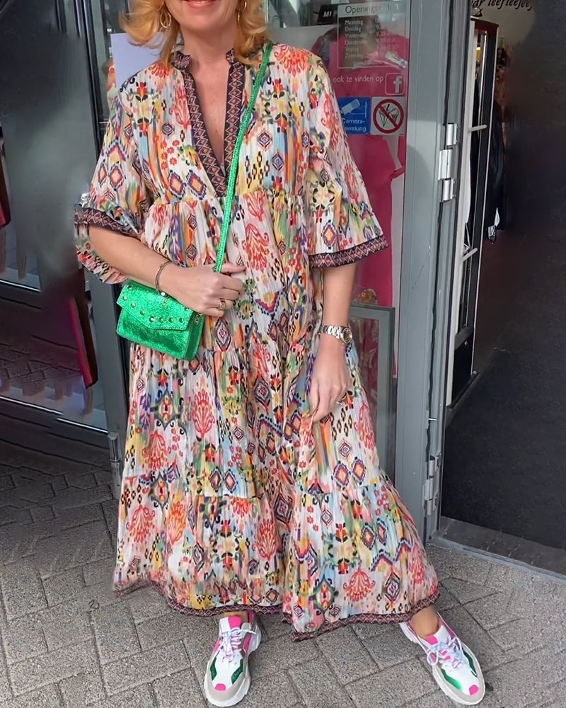 Robe longue élégante imprimée col V