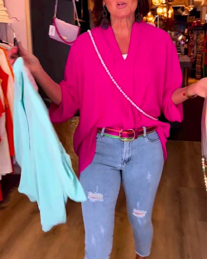 Blouse décontractée de couleur unie avec col en V et manches trois-quarts