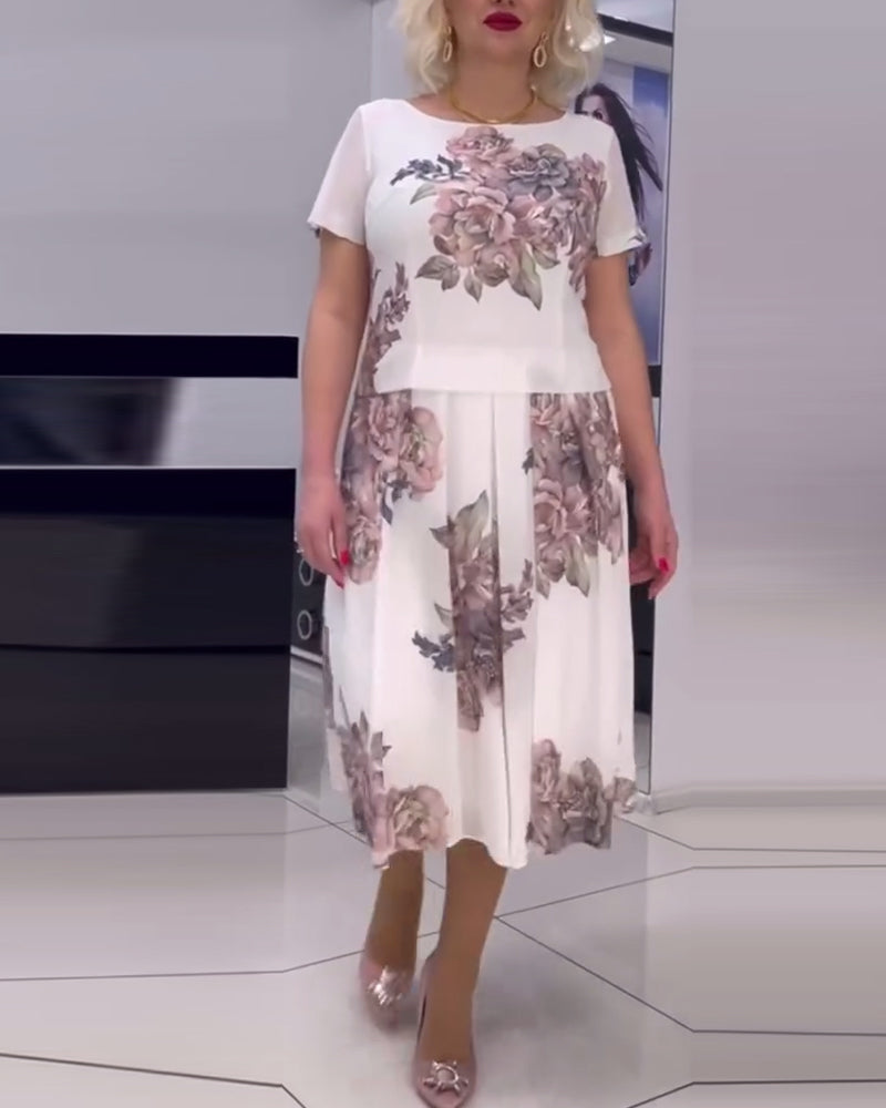 Robe élégante à col rond et imprimé floral