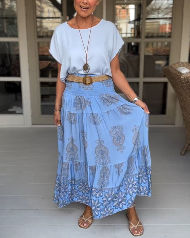 Jupe à empiècements fleuris et plis