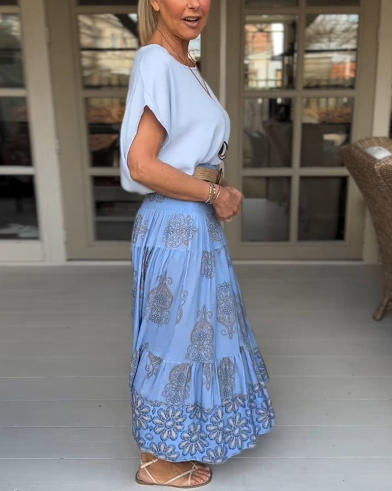 Jupe à empiècements fleuris et plis