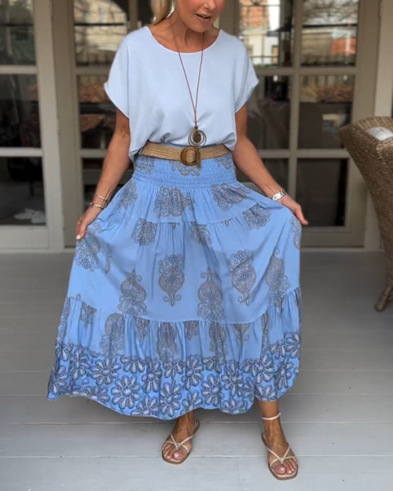 Jupe à empiècements fleuris et plis