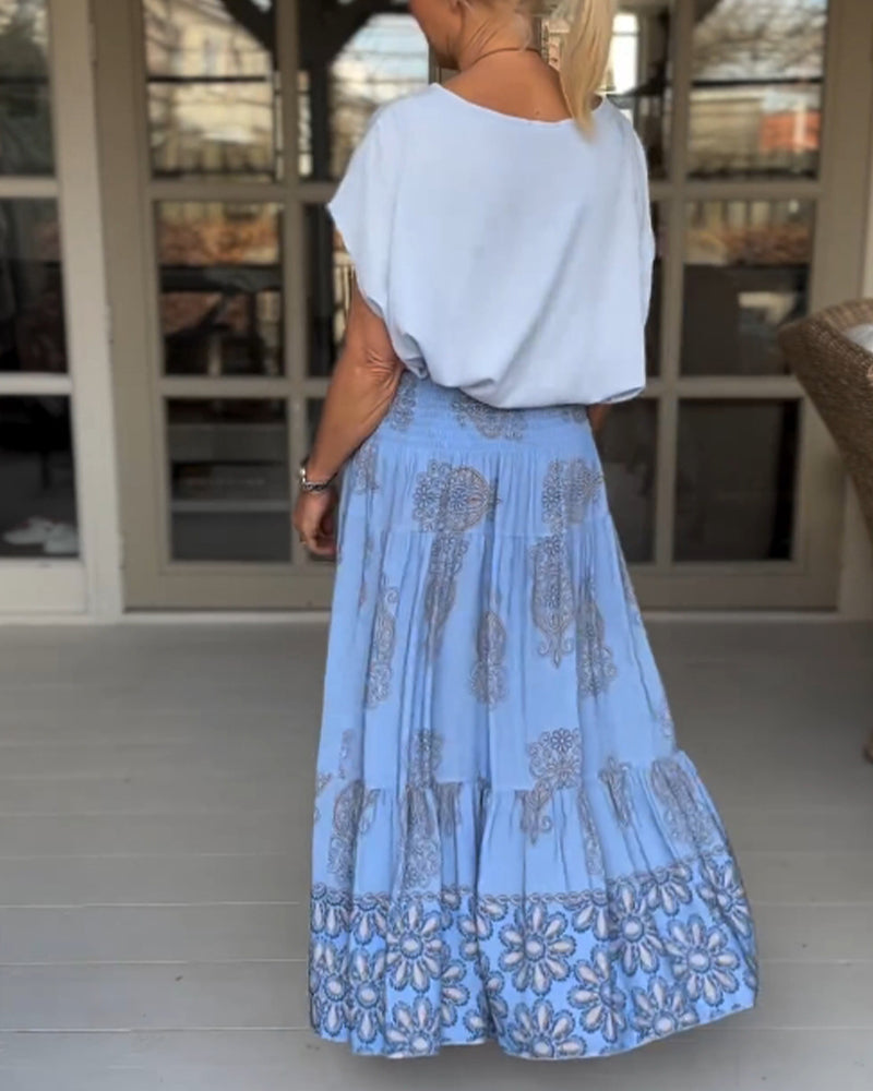 Jupe à empiècements fleuris et plis