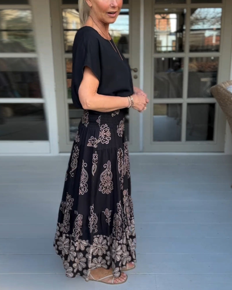 Jupe à empiècements fleuris et plis