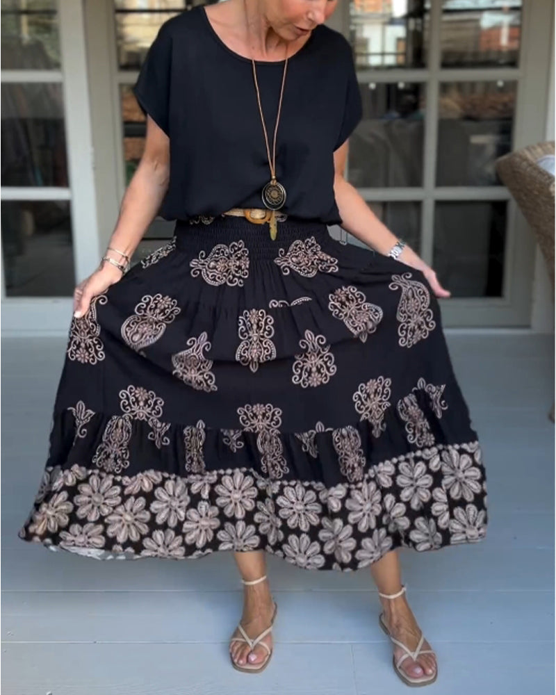 Jupe à empiècements fleuris et plis