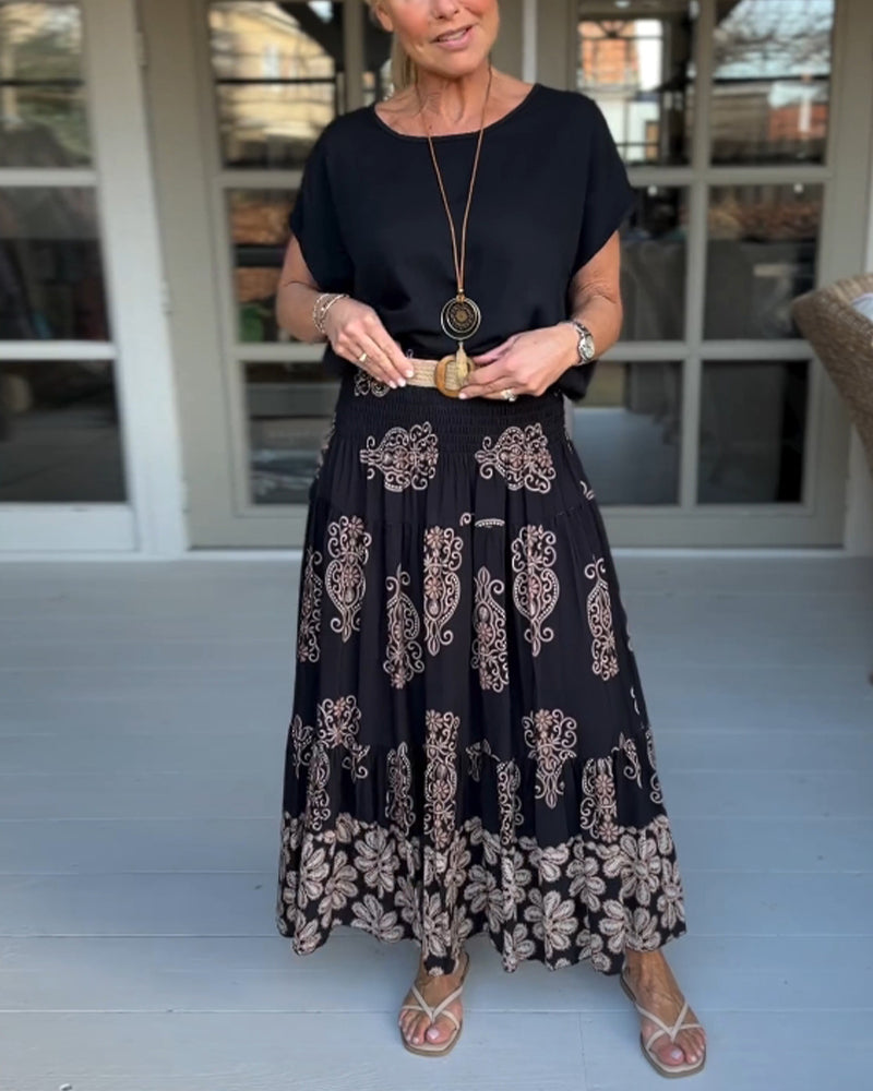 Jupe à empiècements fleuris et plis