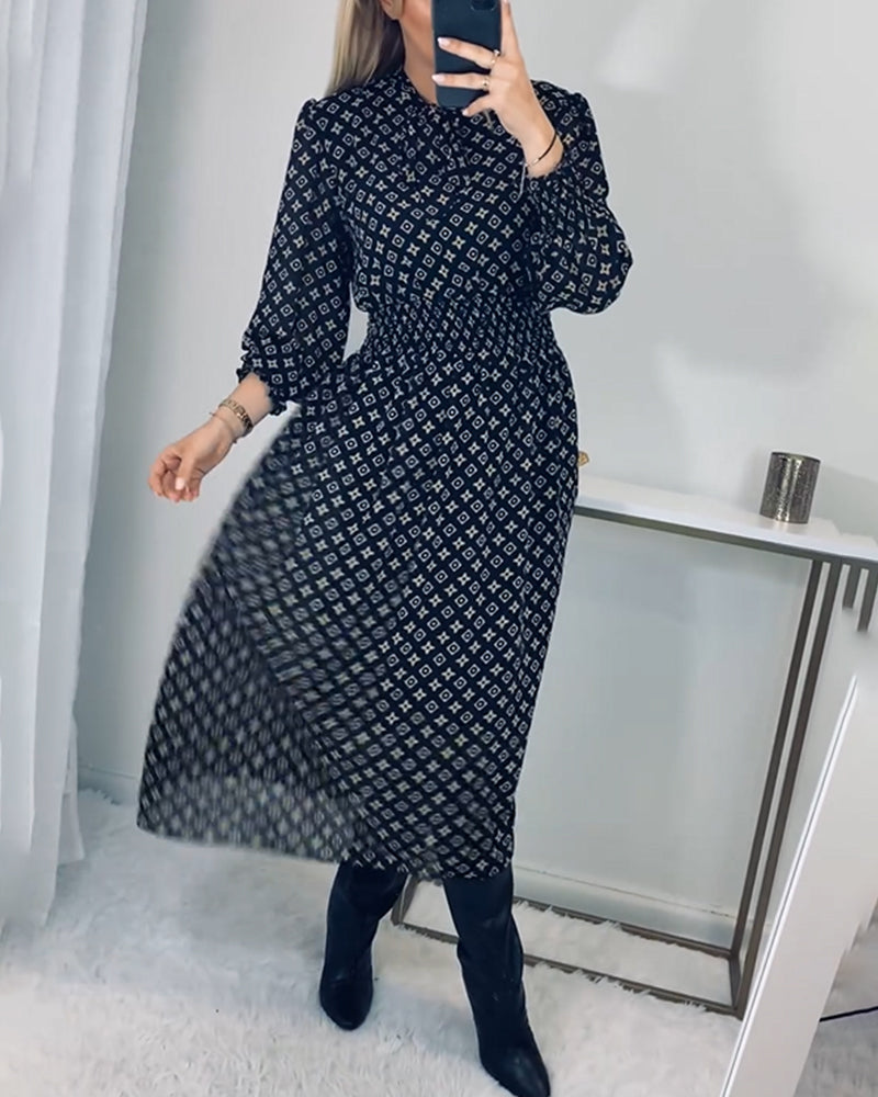 Robe avec imprimé et taille cintrée