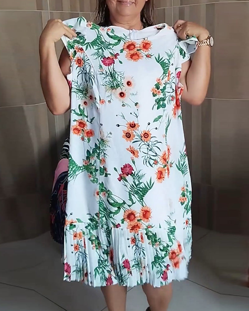 Robe plissée à imprimé floral et à empiècements