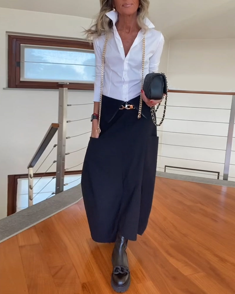 Jupe à poches zippées de couleur unie à la mode