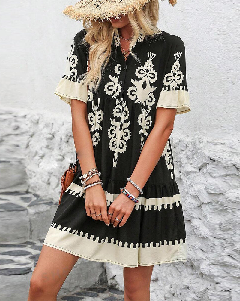 Robe élégante boutonnée à manches courtes imprimée