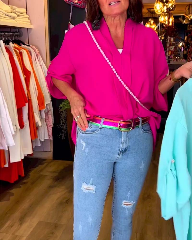 Blouse décontractée de couleur unie avec col en V et manches trois-quarts