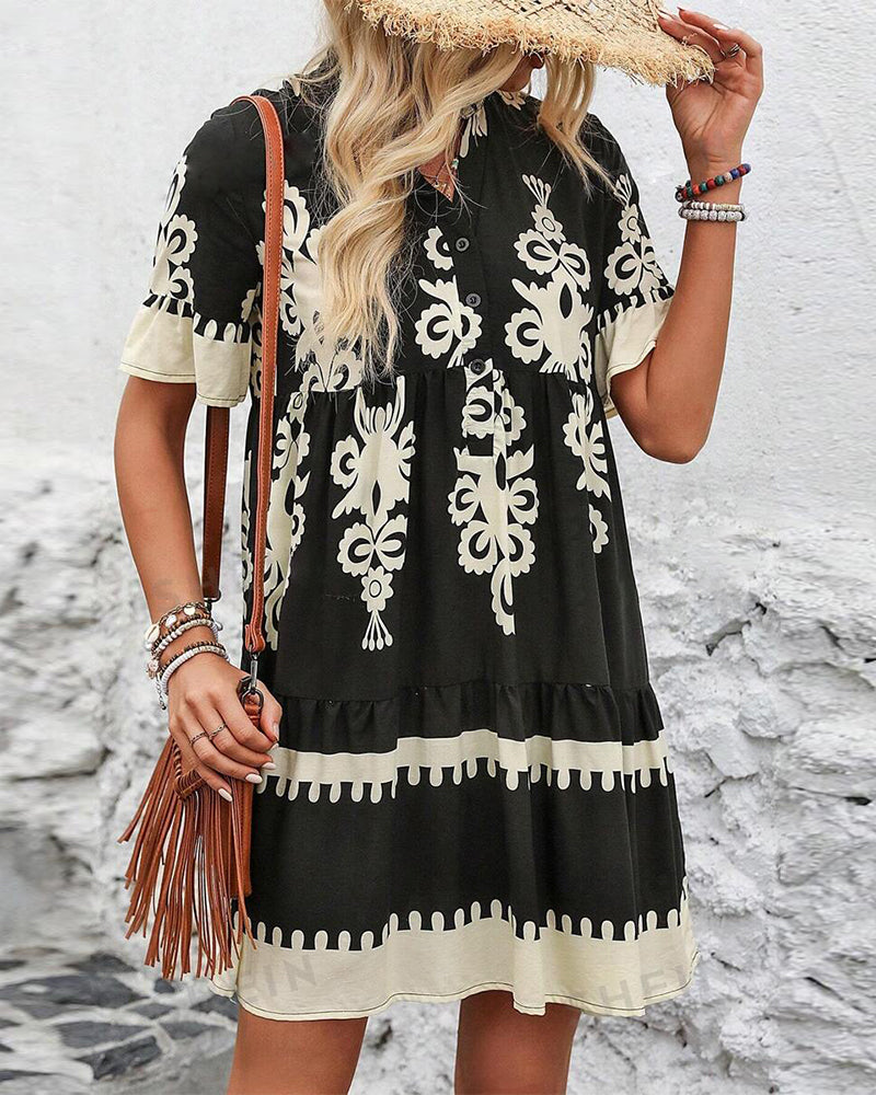 Robe élégante boutonnée à manches courtes imprimée