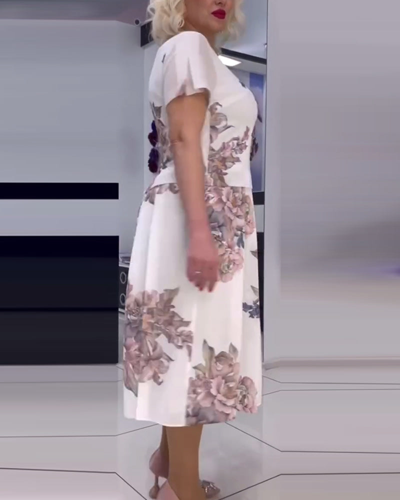Robe élégante à col rond et imprimé floral