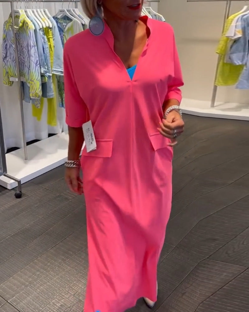 Robe couleur unie fendue à col V