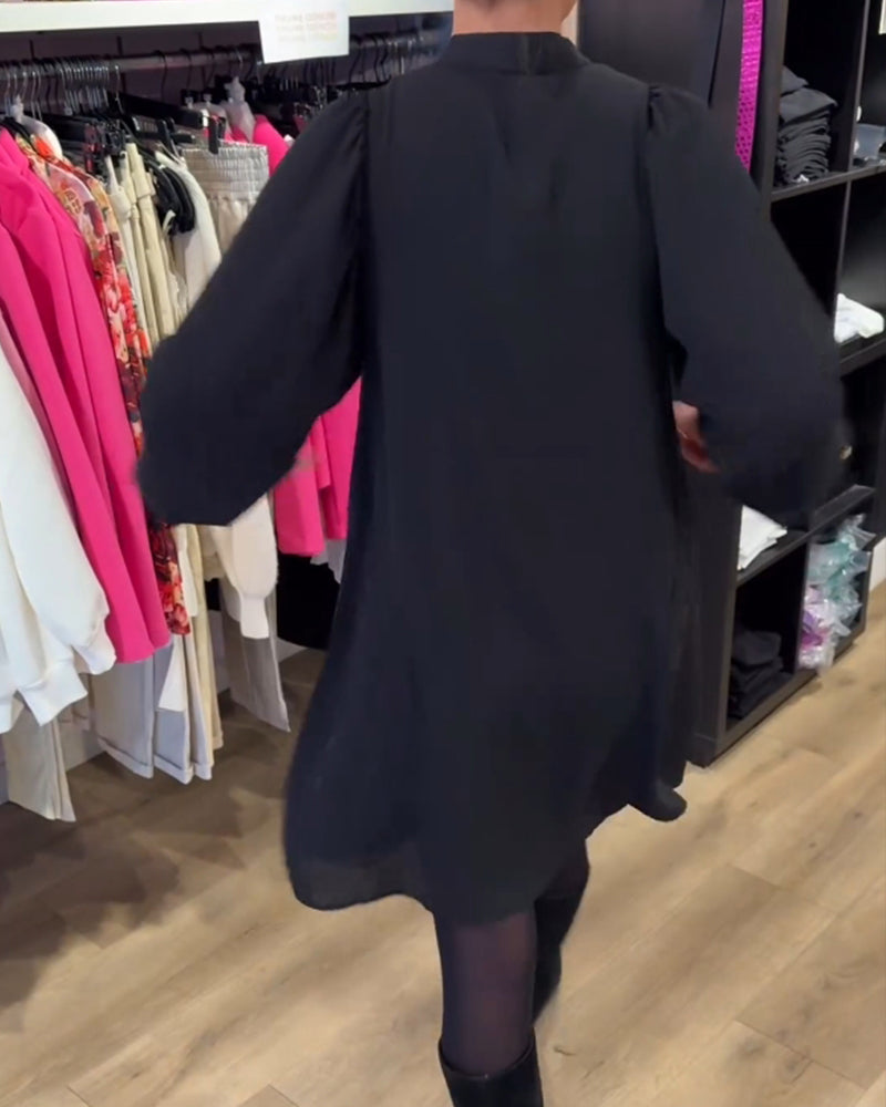 Robe avec col en V et longueur genou