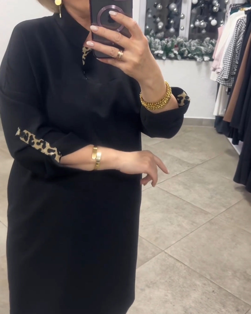 Robe à col montant de couleur unie