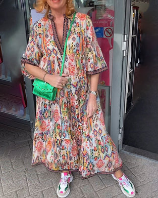 Robe longue élégante imprimée col V