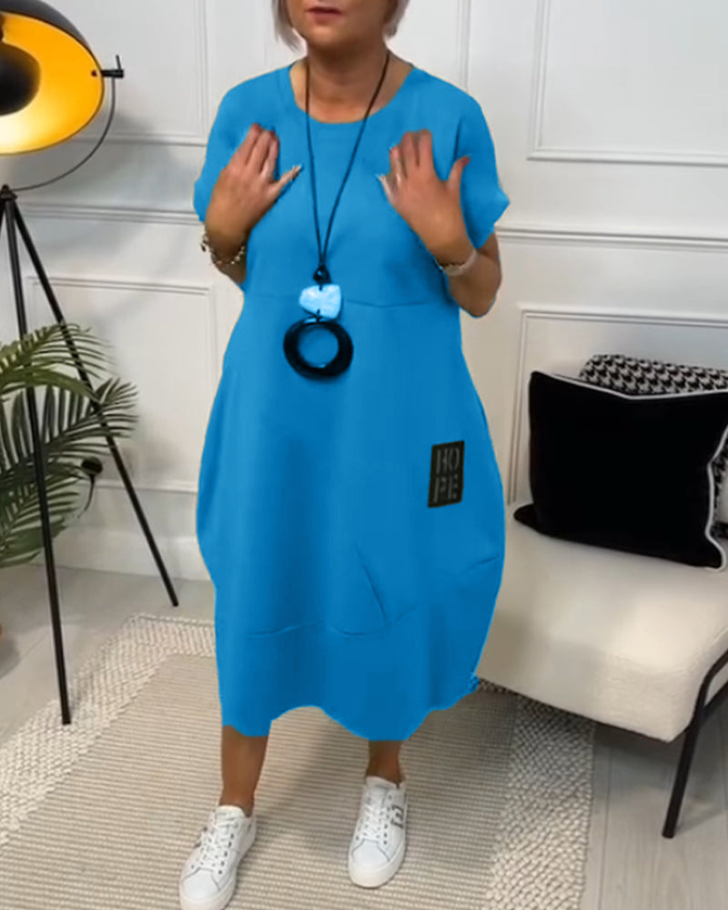 Robe décontractée à manches courtes et imprimé lettre simple