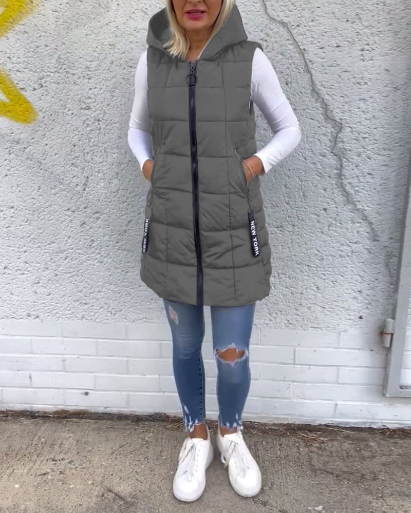 Manteau matelassé sans manches à capuche et fermeture éclair