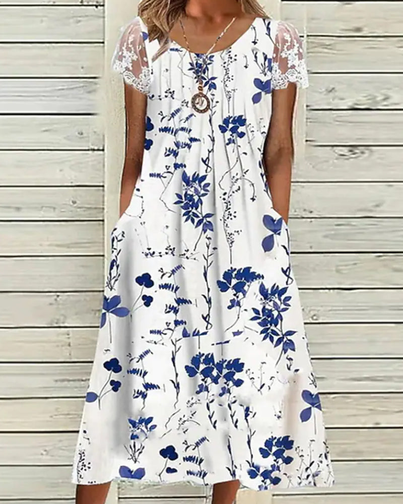 Robe fleurie avec manches en dentelle