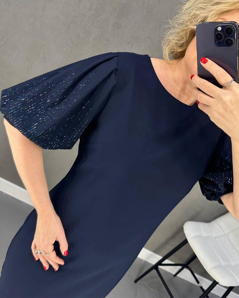 Robe élégante à manches courtes bouffantes