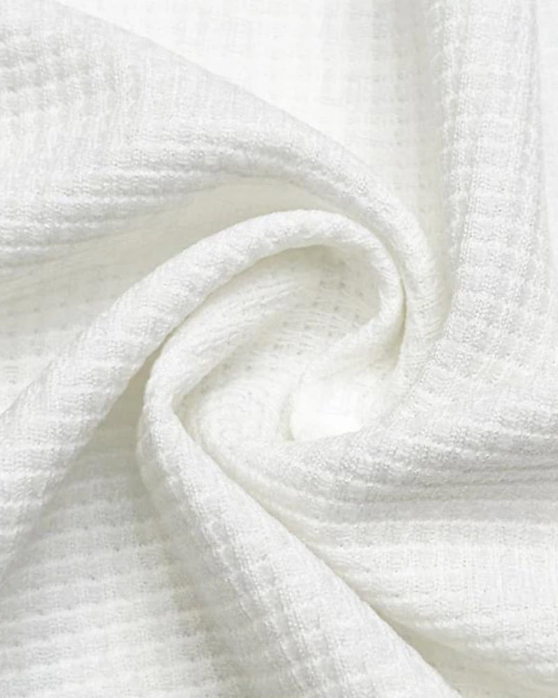 Une Chemise Polo avec un Design de Blocs de Couleurs et de Motif Gaufre