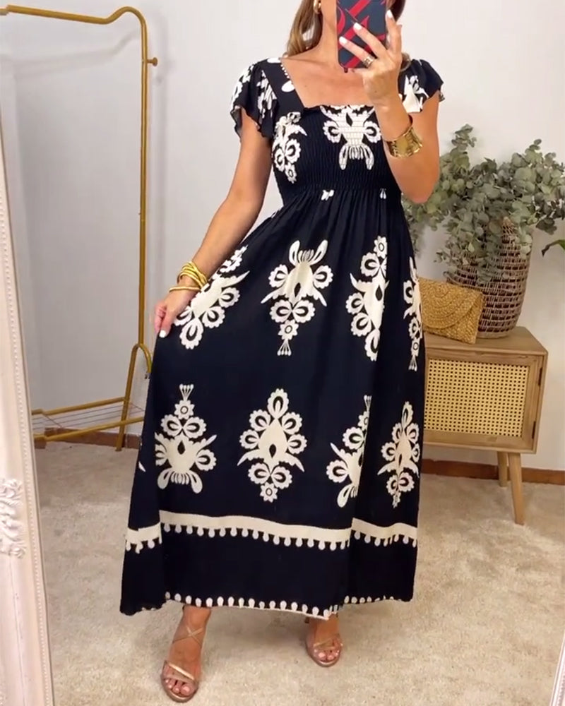 Robe élégante plissée imprimée à col carré