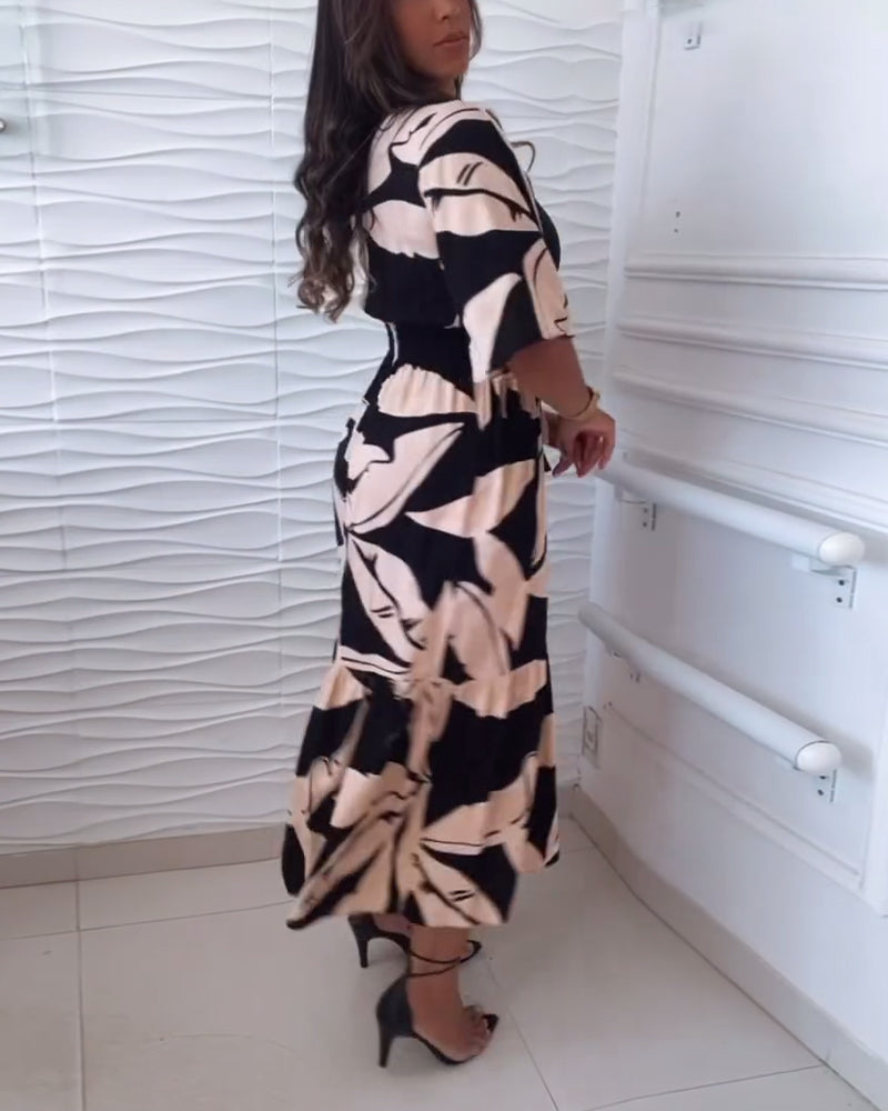 Robe élégante à col en V, manches trois-quarts et cordon de serrage