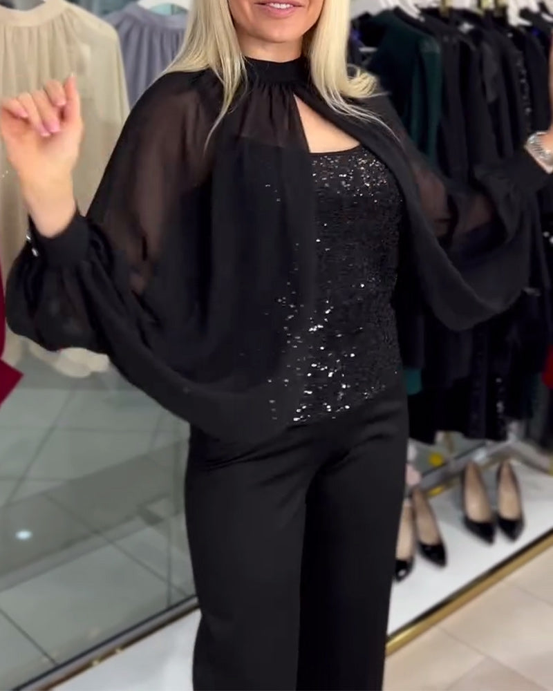 Chemisier à paillettes et manches chauve-souris