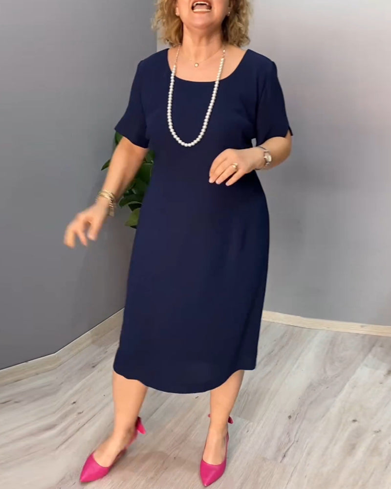 Robe élégante à manches courtes de couleur unie