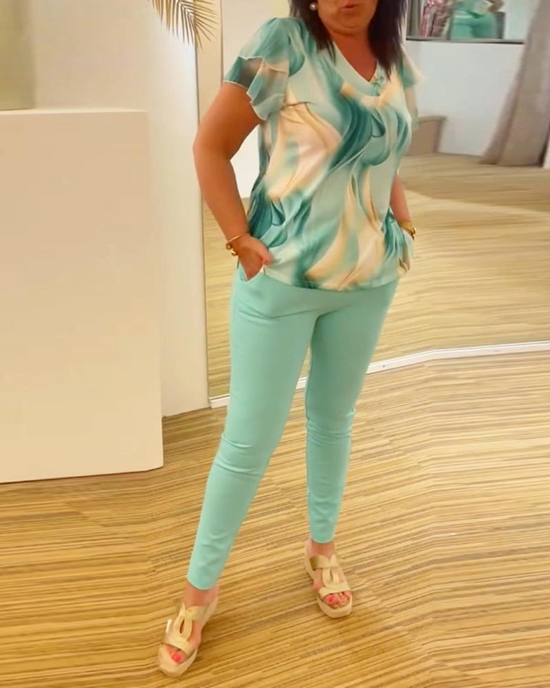 Blouse col V imprimée manches volantées patchwork