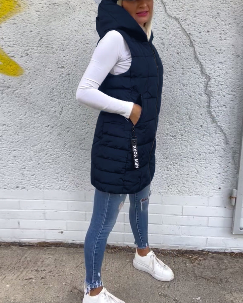 Manteau matelassé sans manches à capuche et fermeture éclair
