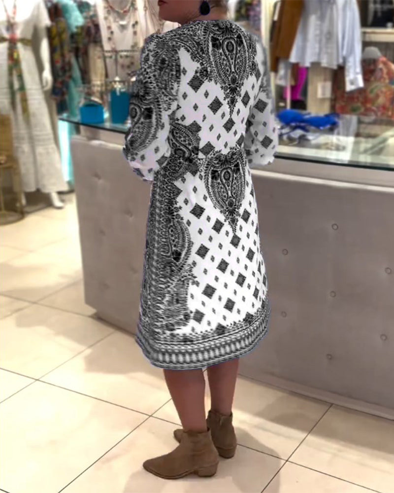 Robe midi élégante à col V