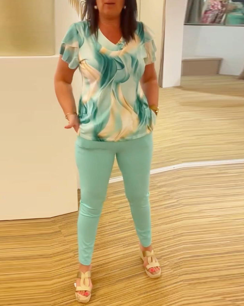 Blouse col V imprimée manches volantées patchwork