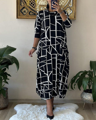Robe ample avec poche et col rond