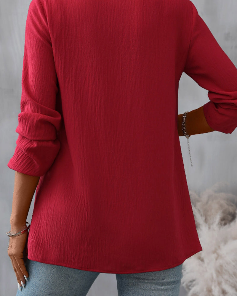 Élégant top en dentelle boutonné avec encolure ronde