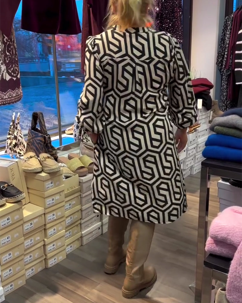 Robe élégante à col en V et motif géométrique