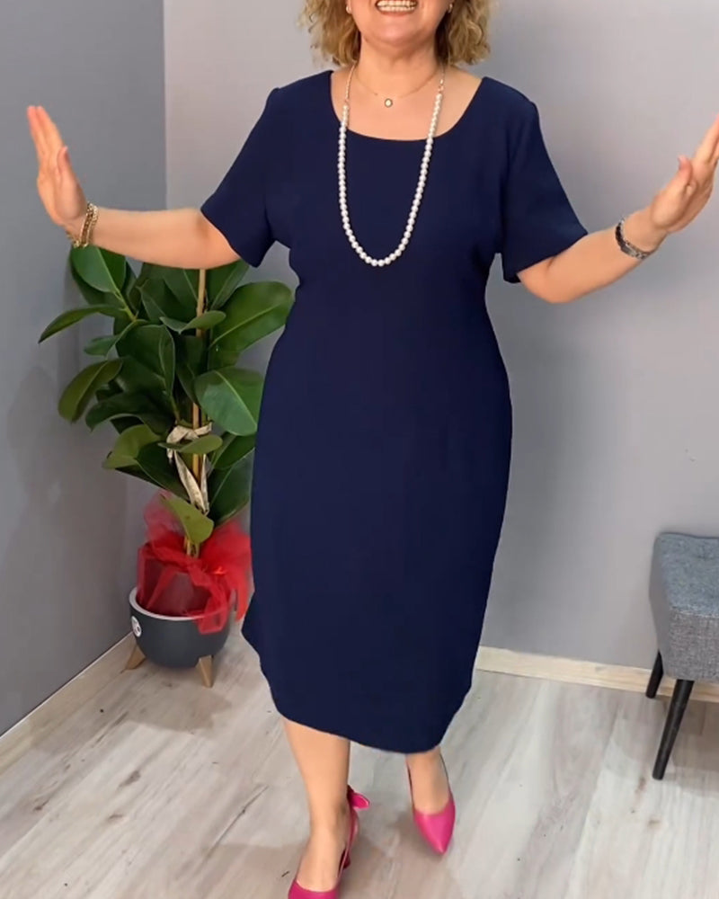 Robe élégante à manches courtes de couleur unie