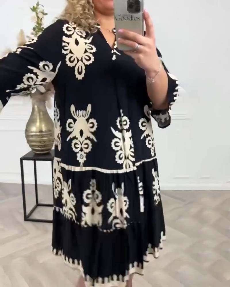 Robe élégante imprimée col V