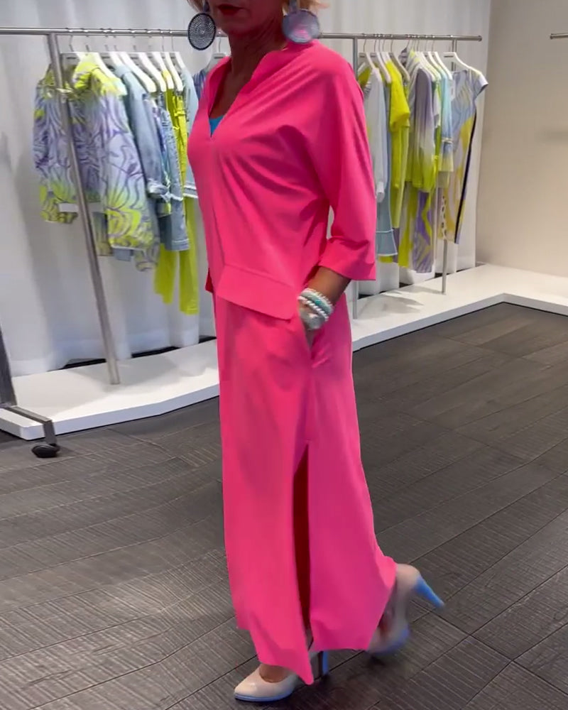 Robe couleur unie fendue à col V