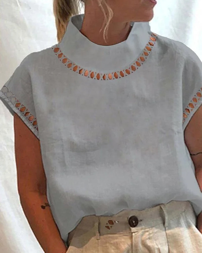 Chemisier col montant en dentelle unie