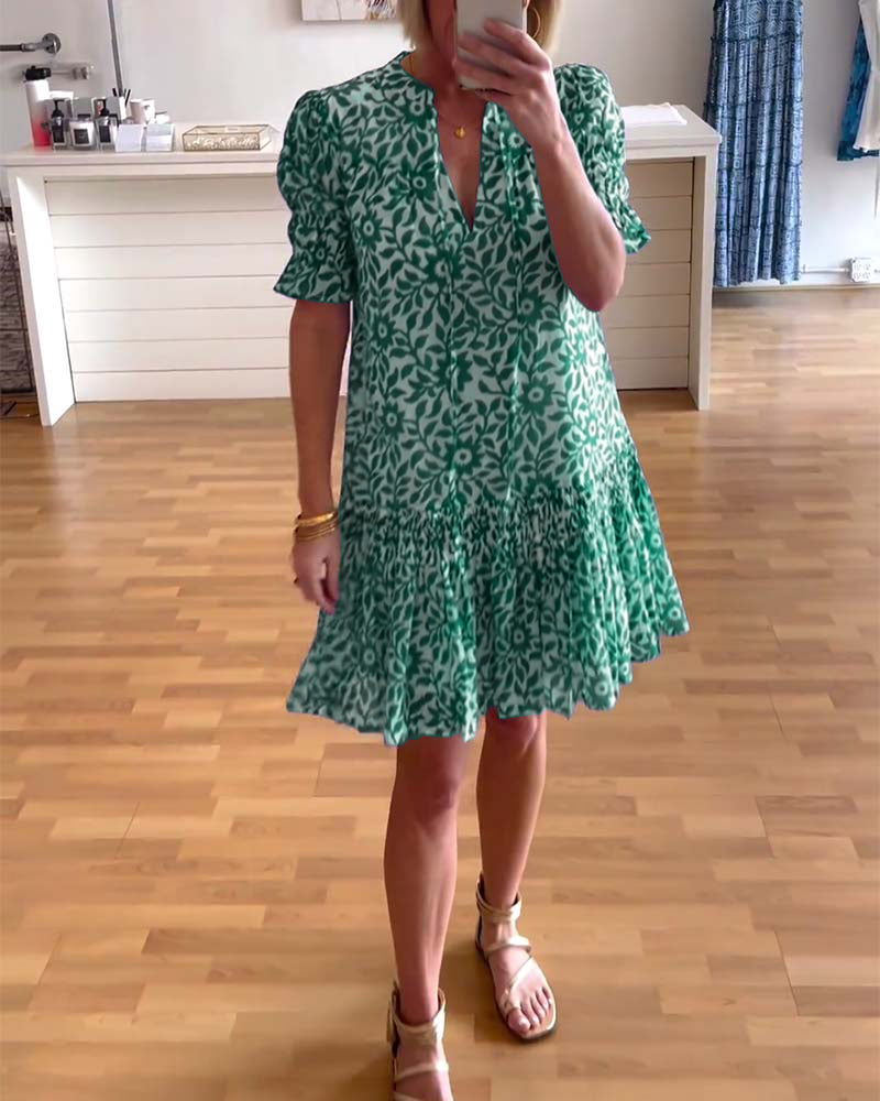 Robe plissée à imprimé floral et manches bouffantes