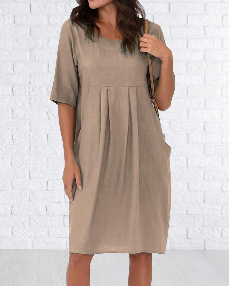 Robe de couleur unie à col rond avec poches