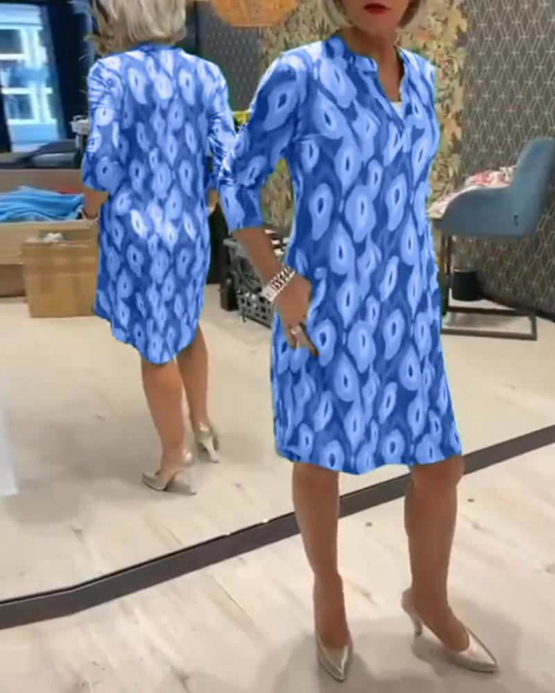 Robe imprimée à col en V et manches trois-quarts
