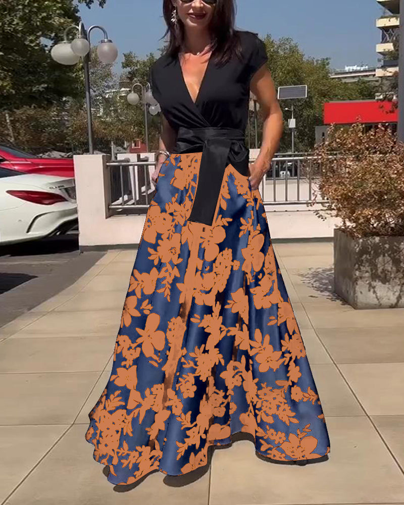 Robe élégante à imprimé floral et manches raglan en V profond