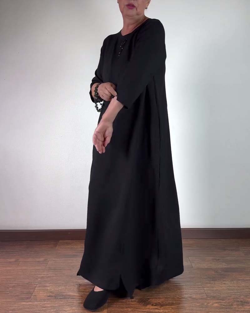 Robe ample à col rond de couleur unie