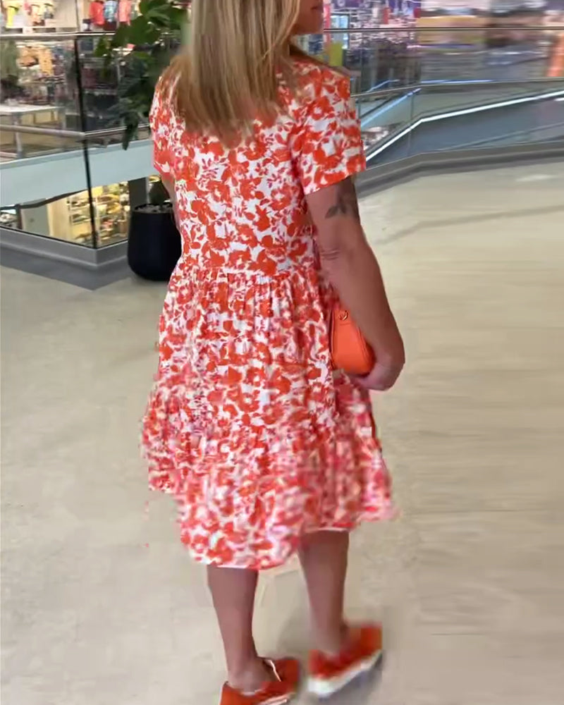 Robe midi à fleurs à manches courtes
